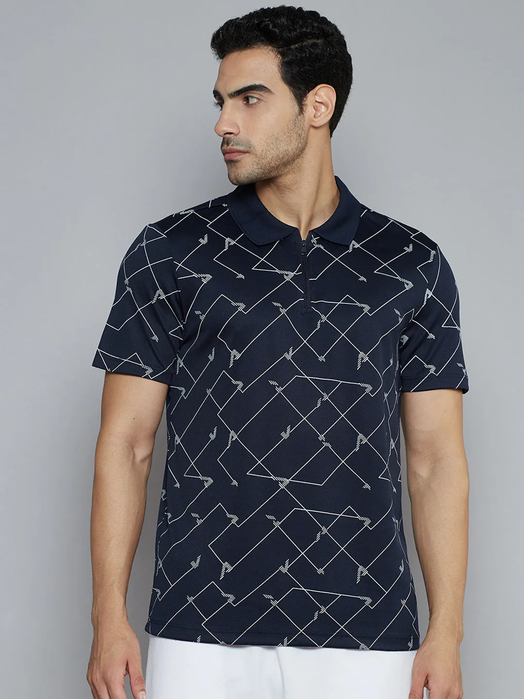 Alcis Men Navy Blue Abstract Printed Polo Collar Slim Fit T-shirt